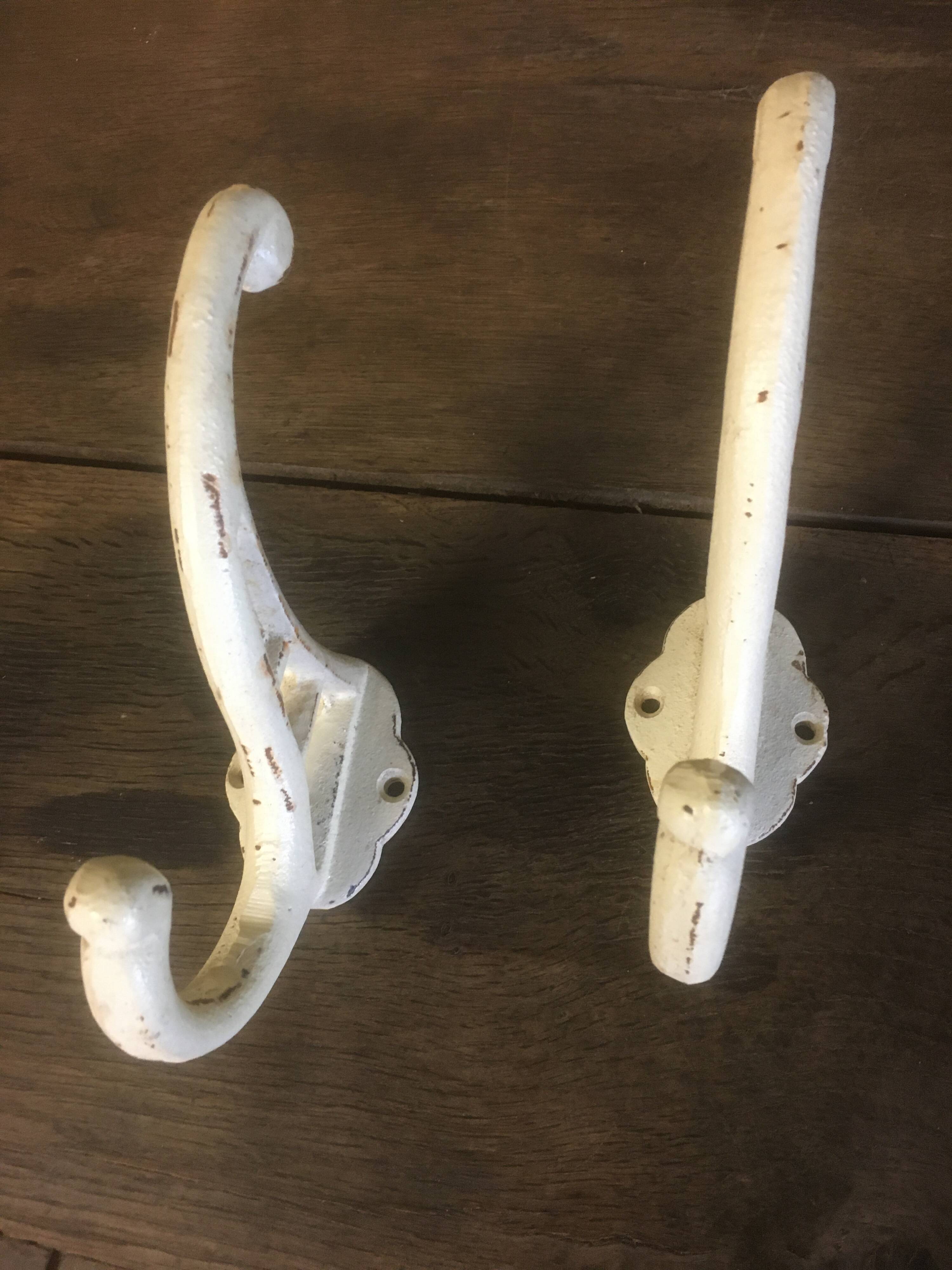 White cast iron wall hooks