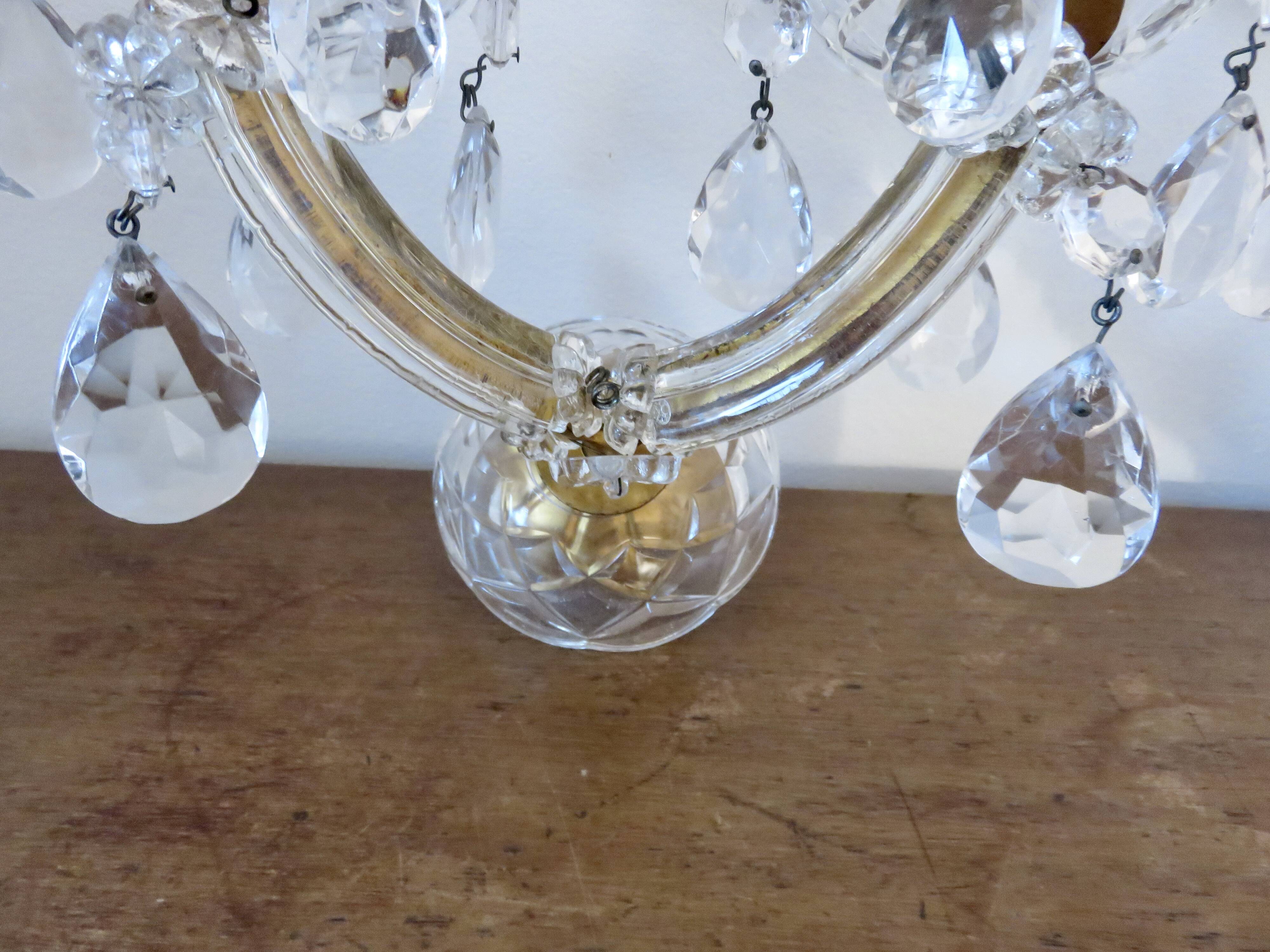 pair of double wall sconces with crystal pendants, made in Italy