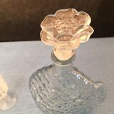 Worked glass carafe and flower-shaped stopper