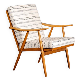 Fauteuil Boomerang tissu berbère