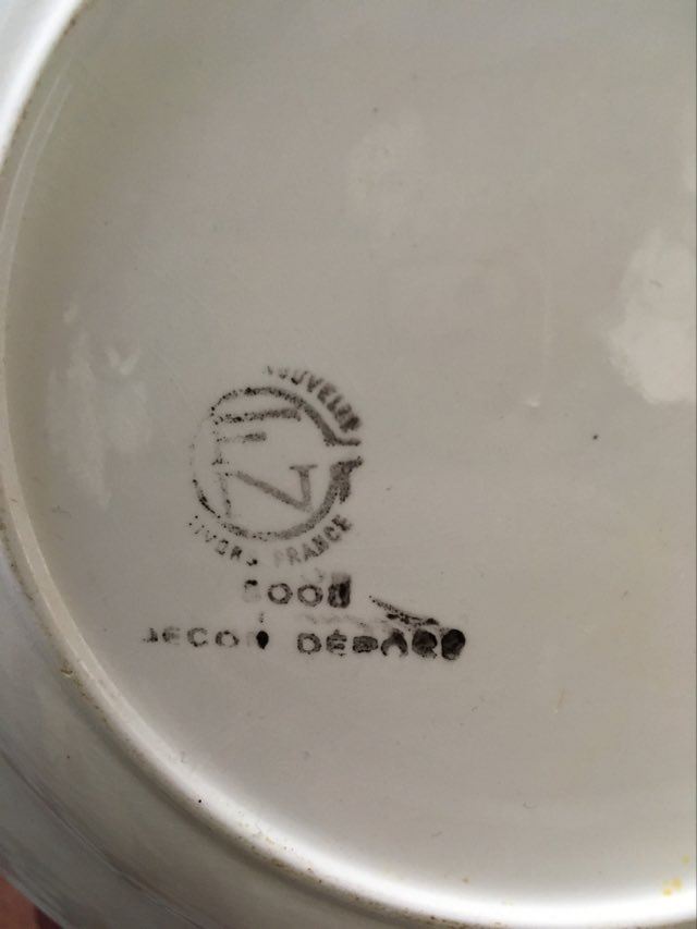 Matching old hollow plates in pink and green.