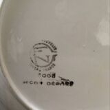 Matching old hollow plates in pink and green.