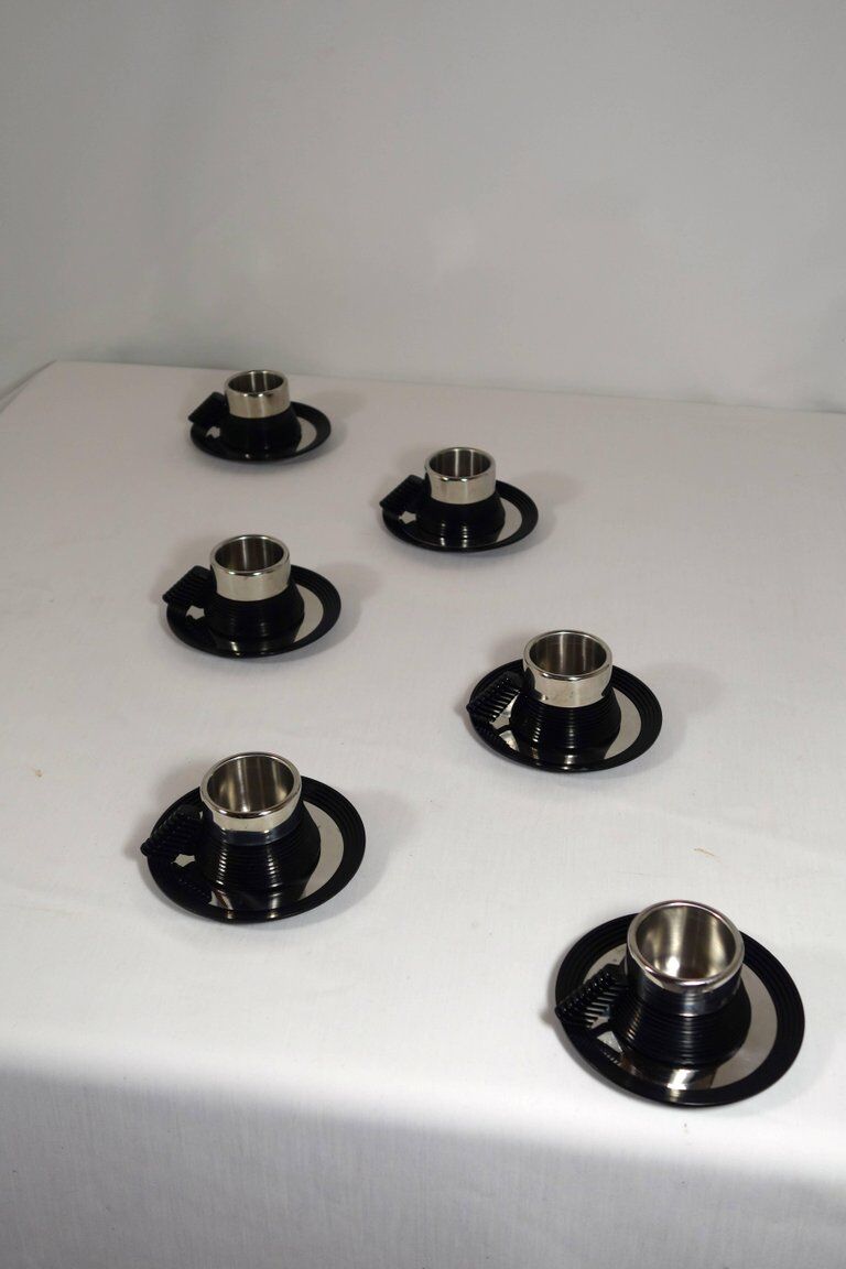 Carlo Giannini cups espresso and a 
