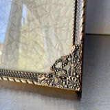 Metal frame in gold colored brass