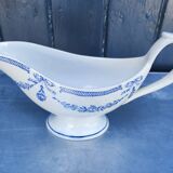 Old earthenware sauce boat