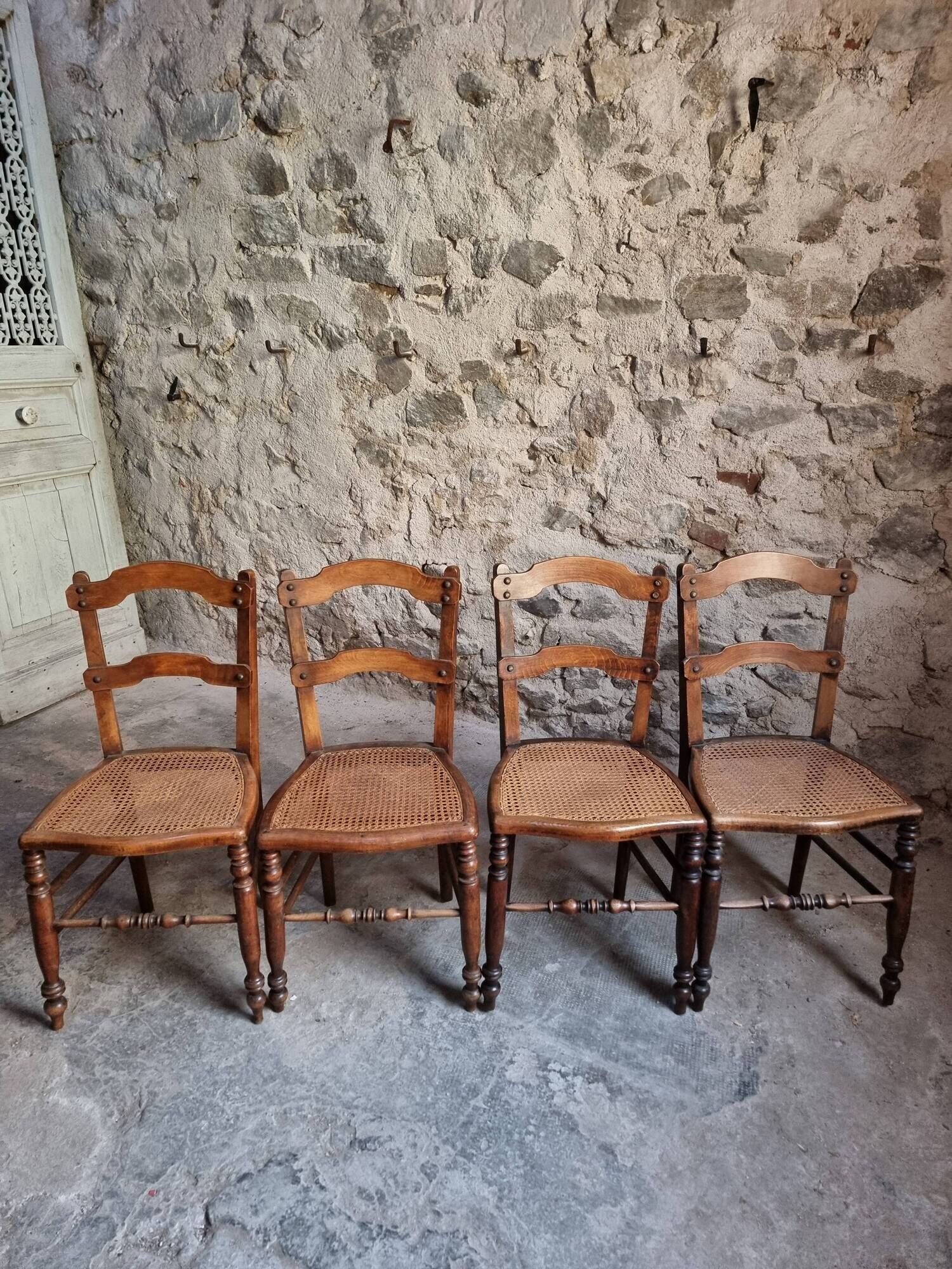 Set of 4 antique dining chairs with caned seats, beech, France, circa 1900–1920.