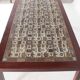 Set of coffee tables in rosewood and ceramic.
