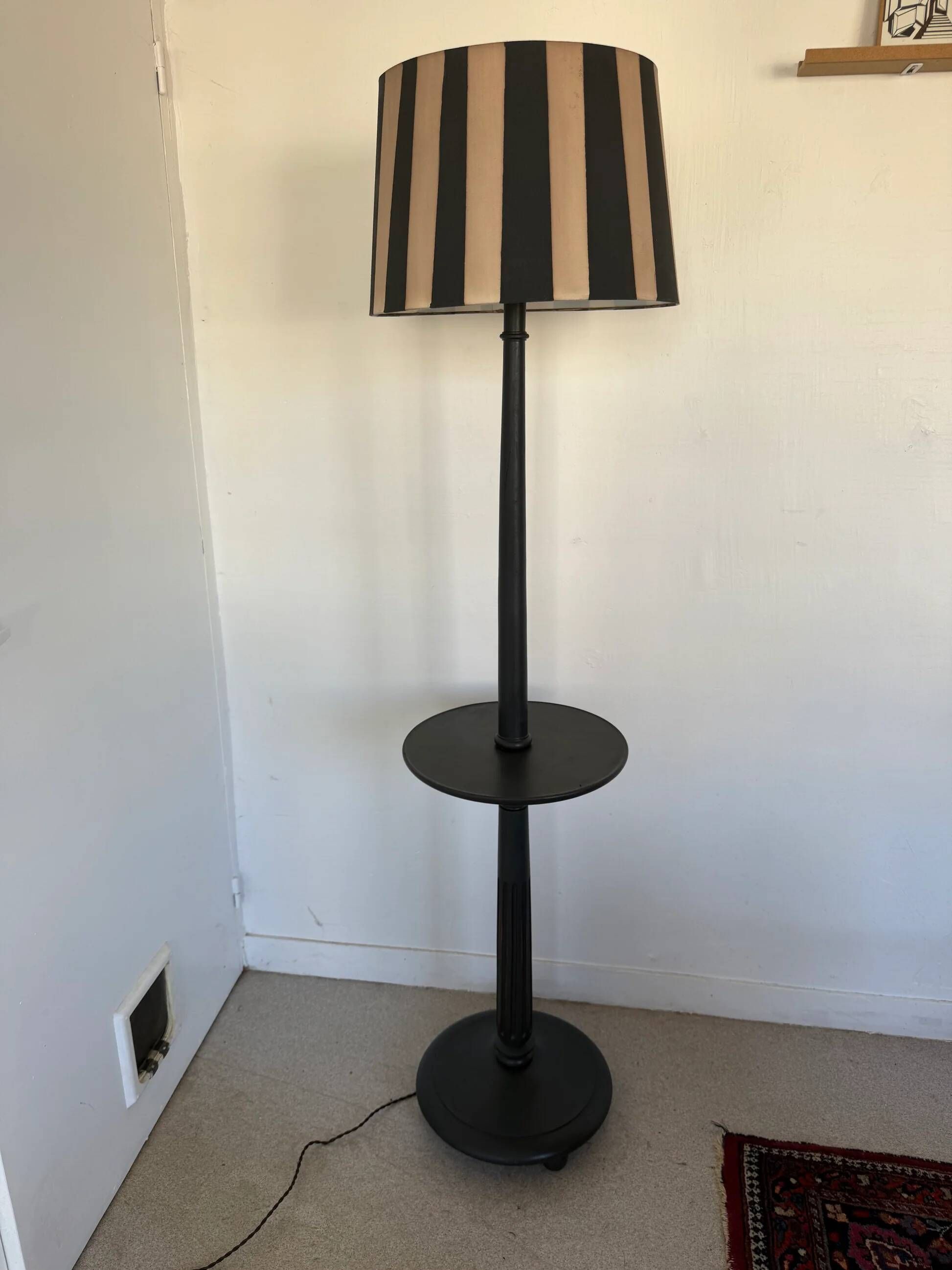 Vintage floor lamp in black patinated wood and striped lampshade