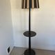 Vintage floor lamp in black patinated wood and striped lampshade