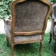 Pair of Louis XV style bergères in moulded and carved wood.