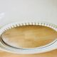 American beige round wall mirror 1970
