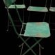Set of 8 industrial folding chairs in green painted metal