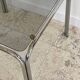 Table basse annees 70 verre et acier chromé