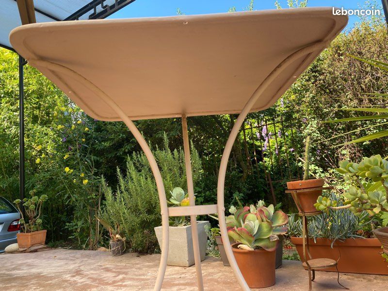 Wrought iron pedestal table