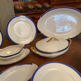 Limoges porcelain table service with blue band on white and gold background