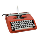 Hermès Baby orange typewriter.
