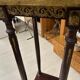 Wooden and brass saddle