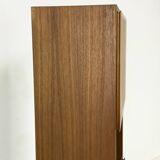 Narrow teak bookcase with two doors by Omann Jun, 1970s