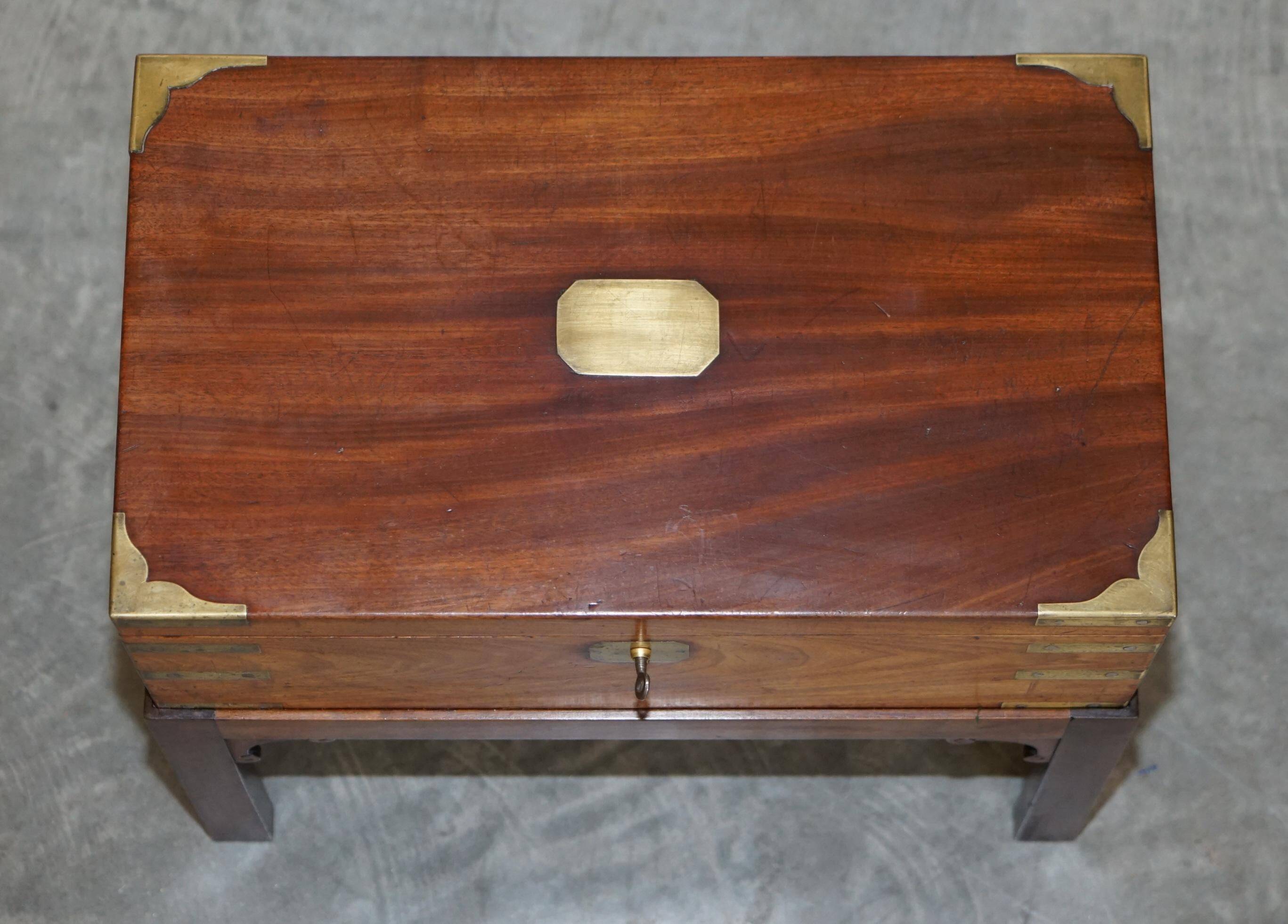 Antique hardwood military campaign desk with writing slope.