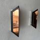 Pair of French wall lights with geometric design in copper, 1960, France.