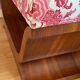 Art-deco walnut bench with floral fabric