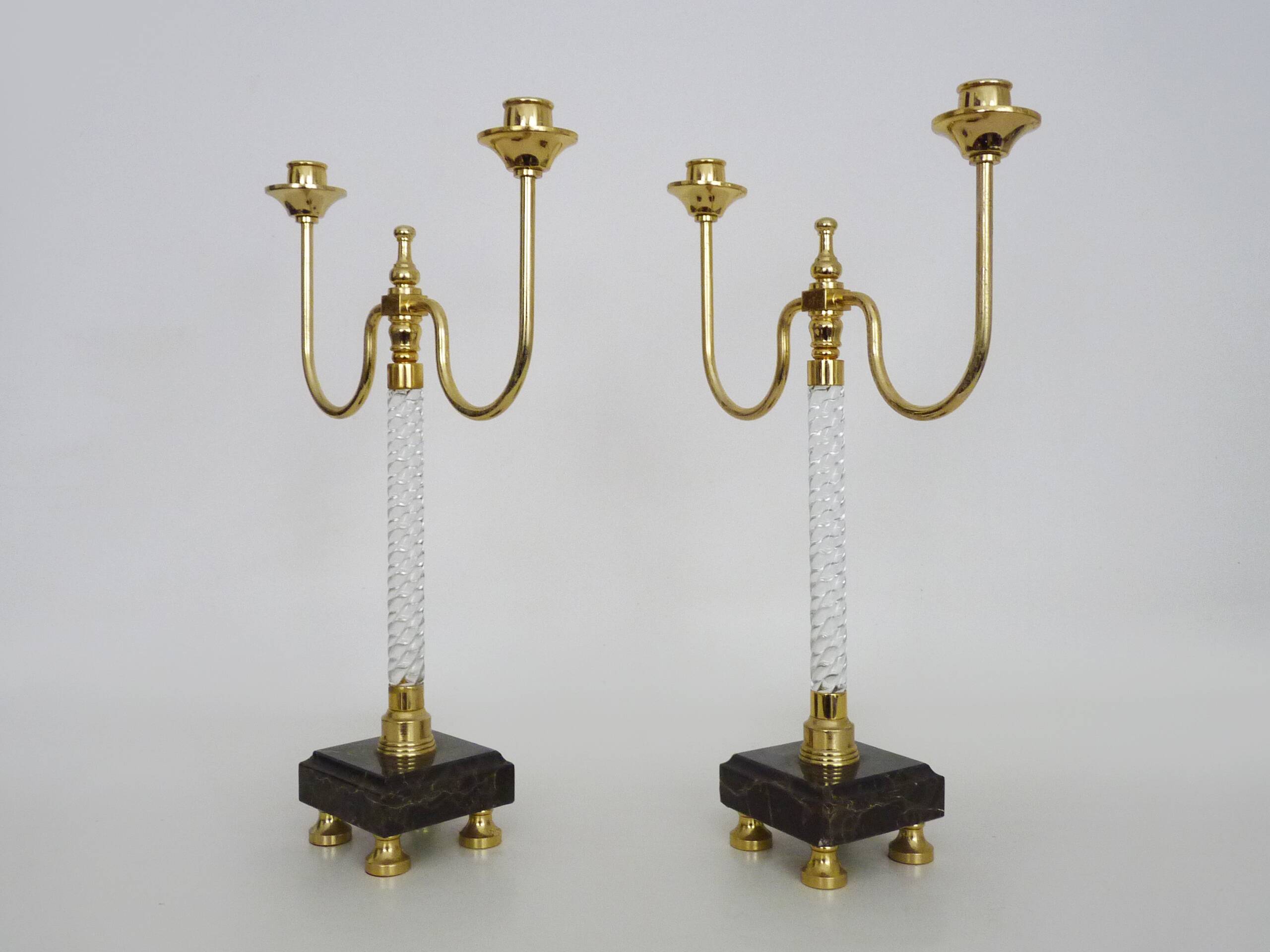Pair of large candlesticks, Restoration style in brass, black marble, glass. 19th century