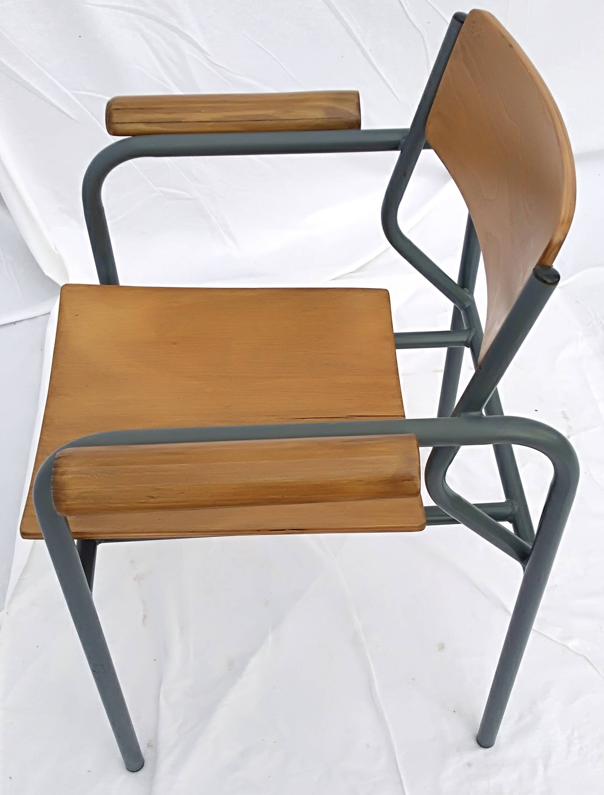 armchair tubular structure wooden seat and armrests