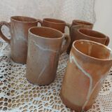6 stoneware mugs / cups / tankards