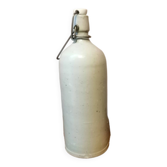 Old gray stoneware bottle