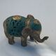 Éléphant en laiton doré et patine verte vintage