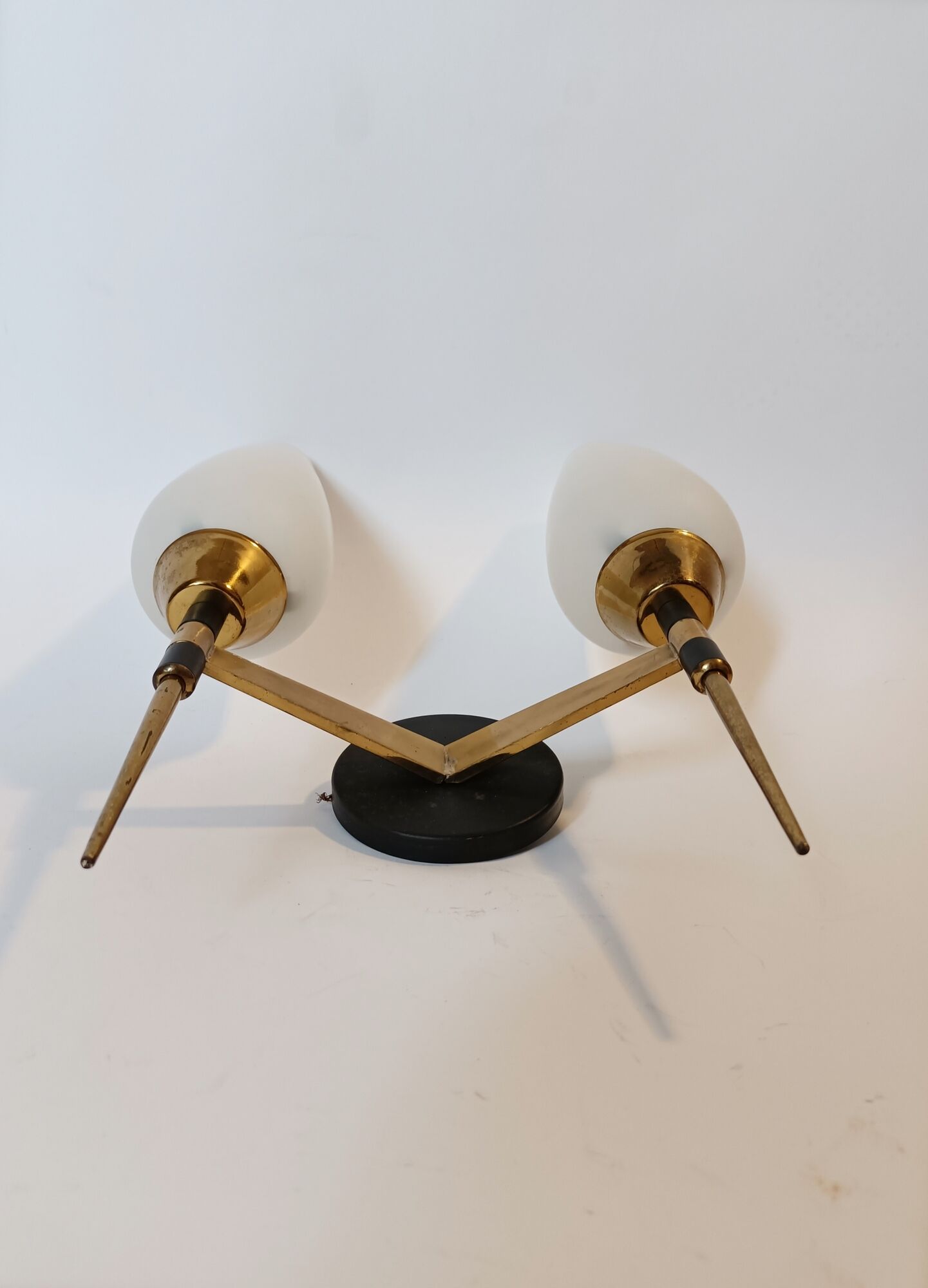 M.D two-arm wall lamp in gilded brass and black metal 1960