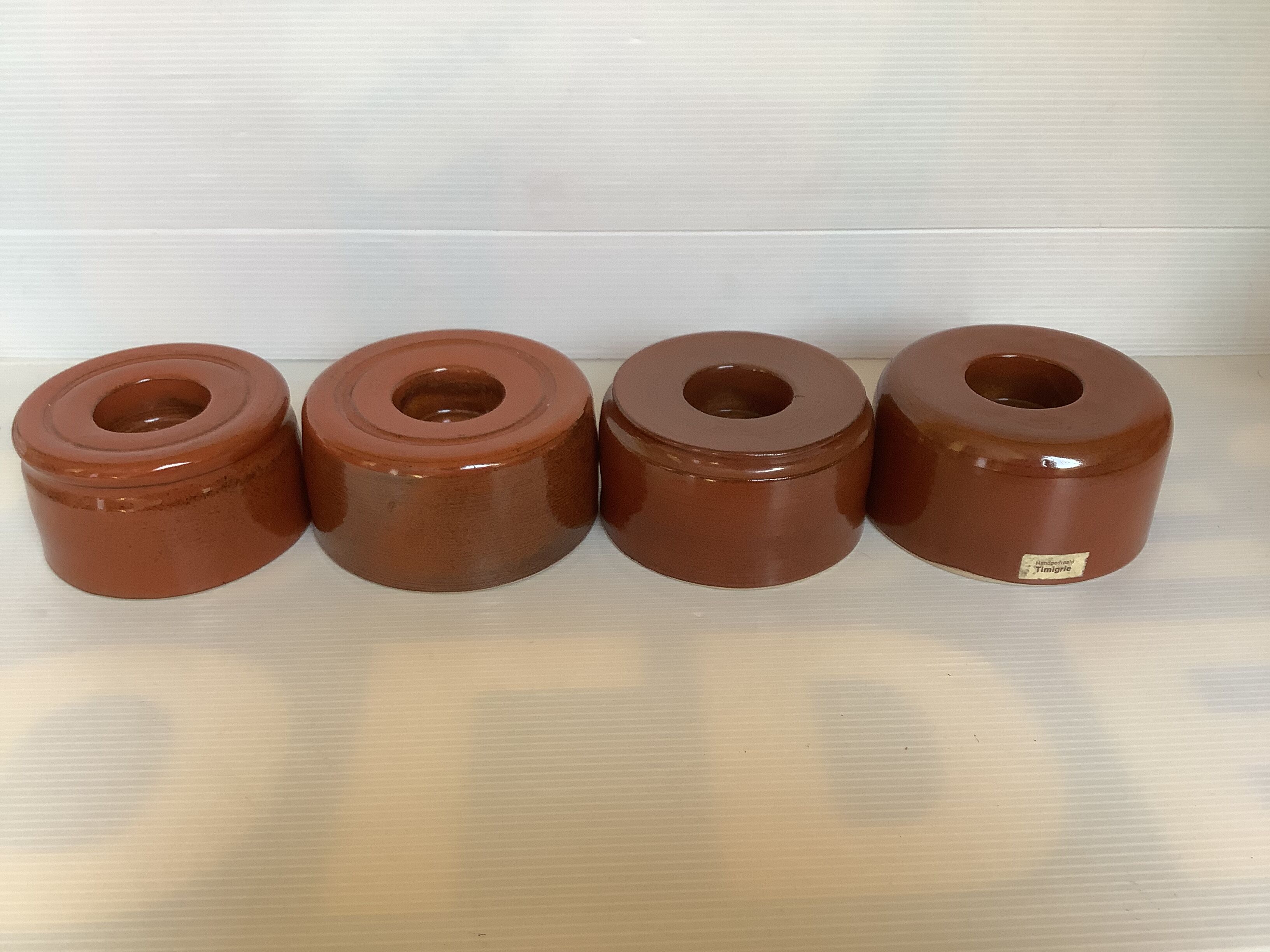 Four ceramic candlesticks AVV VVK Yser Tower Dixmude