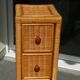 Rattan chiffonnier braided on metal feet