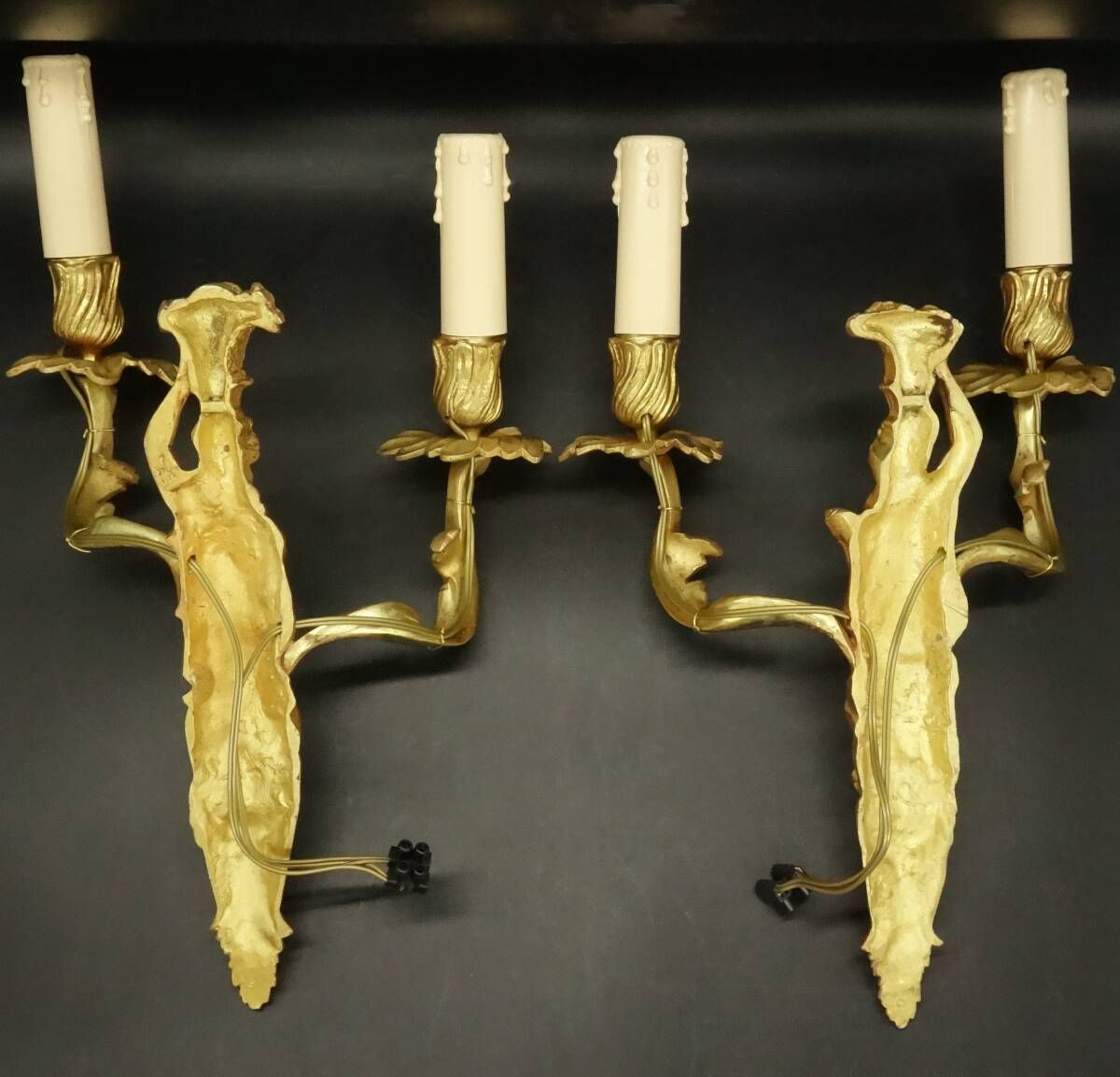 Pair of large caryatid wall sconces in Louis XV style from the 19th century - gilded bronze.
