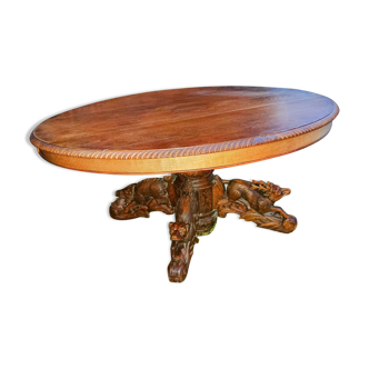 1850 oval hunting table with central legs with sculpted animals