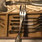 Cake shovel and twelve silver metal dessert forks