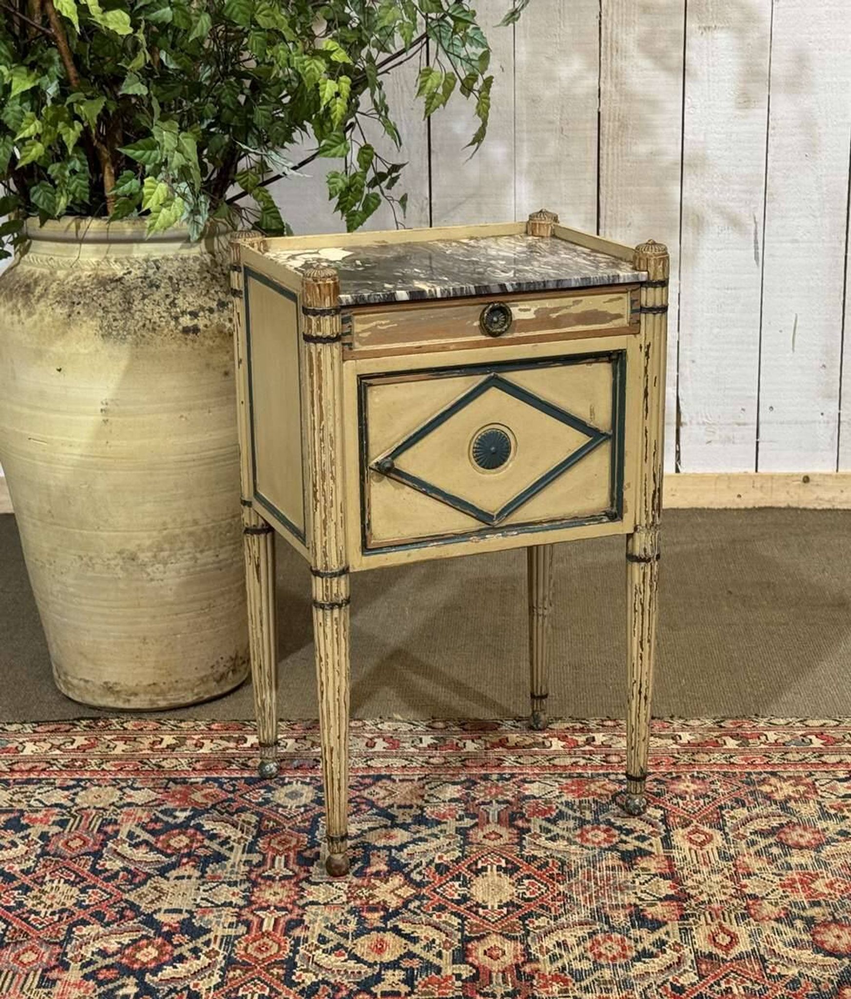 Beech bedside table painted with a marble top in Louis XVI style from the late 19th century.