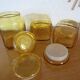 Ensemble de trois pots bocaux en verre jaune vintage