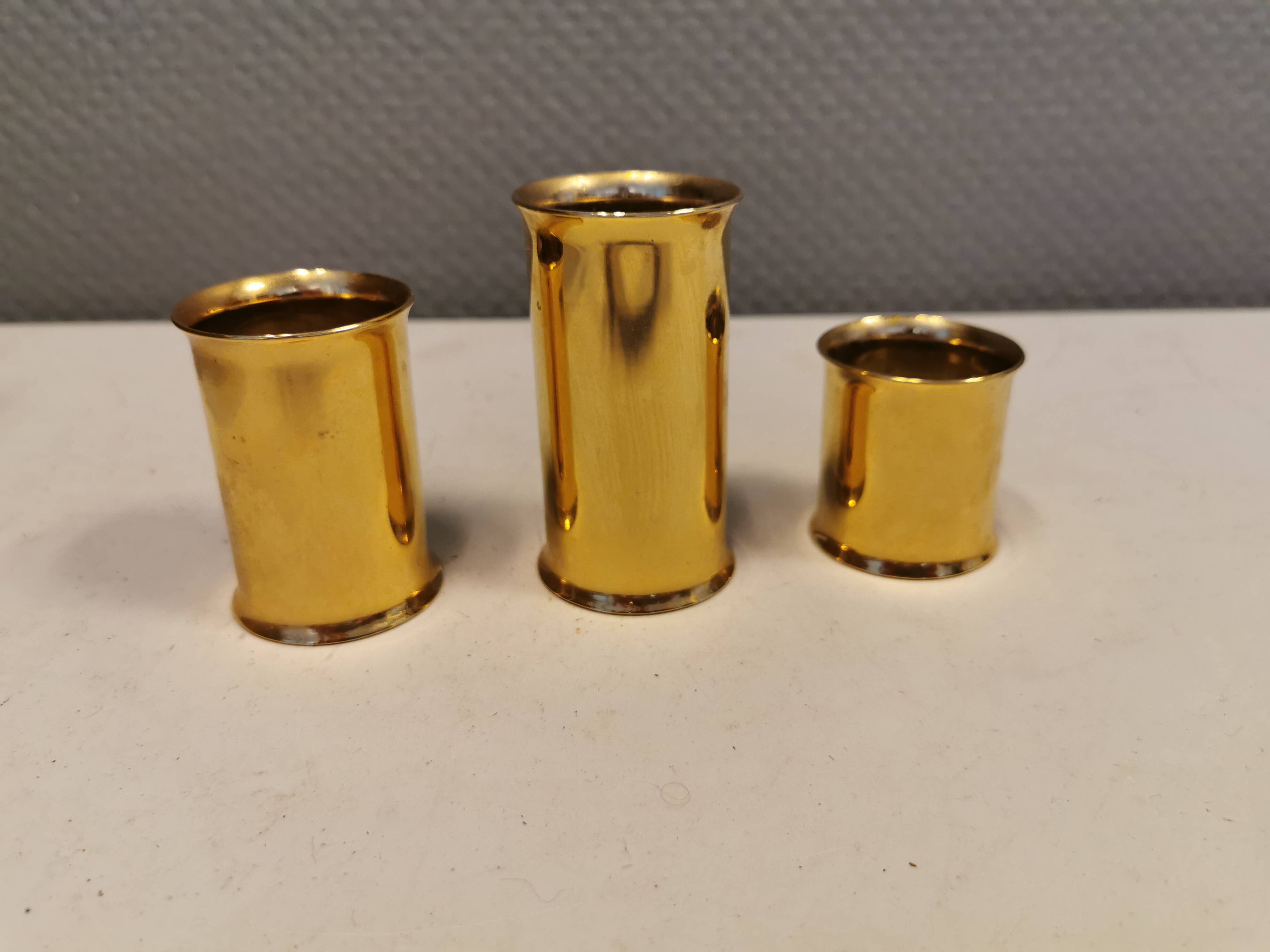 3 beautiful candle holders in 24 carat gold plating.  From Danish Altecco.