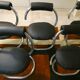 Cobra chairs in steel and black leather by Giotto Stoppino, 1970s, set of 5.