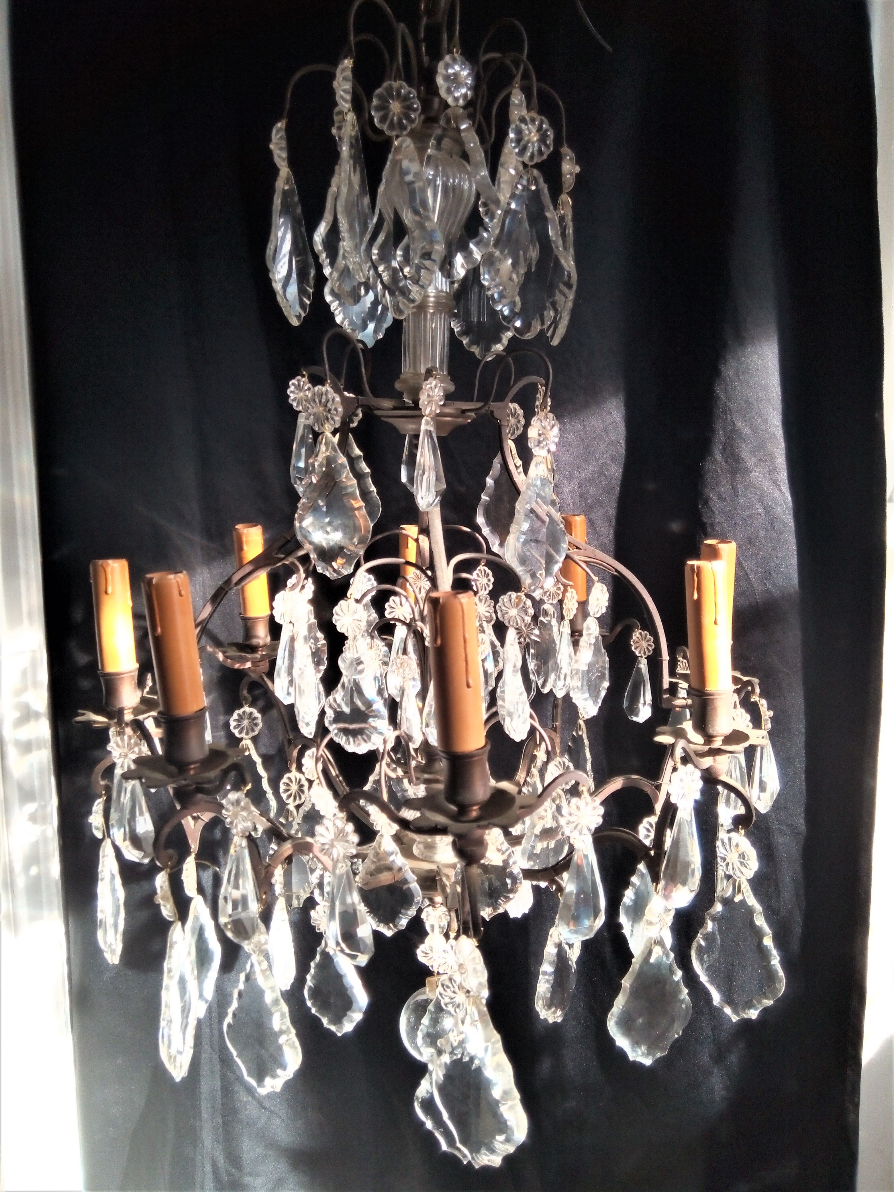 Old chandelier with tassels, bronze and crystal, 8 lights. Louis XV style.
