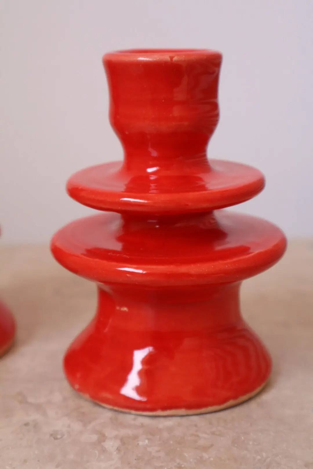 Pair of colorful poppy red ceramic candle holders