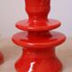 Pair of colorful poppy red ceramic candle holders