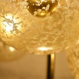 “Cascade” brass chandelier with amber globes