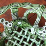 Antique woven basket in green glazed ceramic, fish decoration
