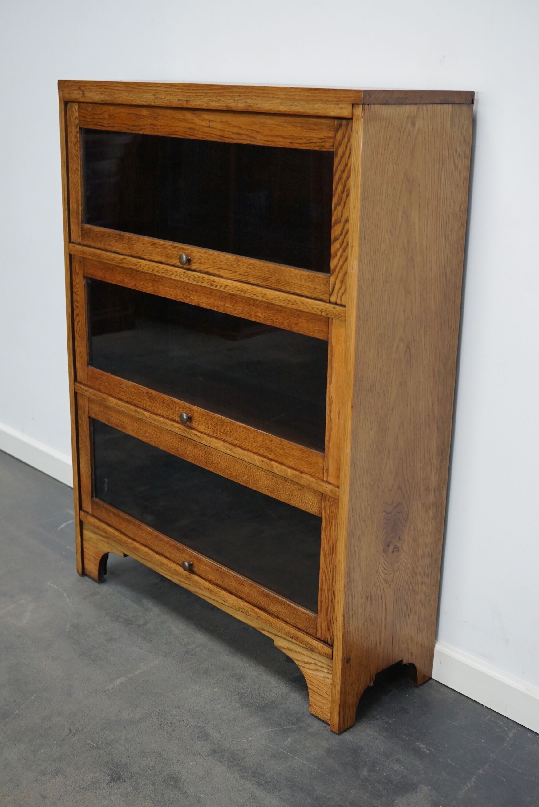 German Oak Bookcase with Folding Doors In Style of Globe Wernicke, ca 1930s