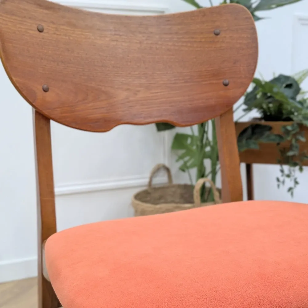 Pair of vintage orange Scandinavian chairs