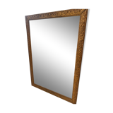 Old mirror in gilded wood