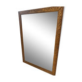 Old mirror in gilded wood