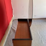 Scandinavian teak dressing table with a large round mirror.